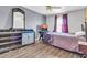 Bedroom with TV and wood floors at 31269 N Cavalier Dr, San Tan Valley, AZ 85143