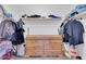 Walk-in closet featuring wood dresser and a variety of hanging clothing at 31269 N Cavalier Dr, San Tan Valley, AZ 85143