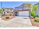 Charming two-story home with a spacious two-car garage and well-maintained landscaping at 31269 N Cavalier Dr, San Tan Valley, AZ 85143
