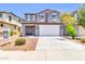Charming two-story home with a spacious two-car garage and well-maintained landscaping at 31269 N Cavalier Dr, San Tan Valley, AZ 85143