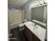 Full bathroom featuring a single sink vanity, shower/tub combination at 318 N Pinal Dr, Apache Junction, AZ 85120