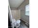 Bathroom featuring a step-in shower and newer toilet at 318 N Pinal Dr, Apache Junction, AZ 85120
