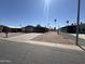 A home with a desert landscape in front at 318 N Pinal Dr, Apache Junction, AZ 85120
