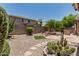 Spacious backyard featuring desert landscaping, a built-in grill, and a private patio area at 35729 N 32Nd Ave, Phoenix, AZ 85086