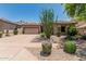 Charming single-story home with a two-car garage and desert landscaping at 35729 N 32Nd Ave, Phoenix, AZ 85086