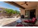 Covered patio with stone flooring, outdoor seating area, and BBQ grill at 35729 N 32Nd Ave, Phoenix, AZ 85086
