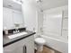 Clean bathroom featuring a modern vanity, sink, and shower with tub combination at 4050 E Cactus Rd # 107, Phoenix, AZ 85032