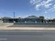 Side view of a well maintained home with a painted gray exterior and block wall at 4502 N 50Th Ave, Phoenix, AZ 85031