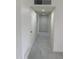 Hallway featuring new flooring and built-in storage cabinets at 4502 N 50Th Ave, Phoenix, AZ 85031