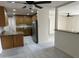 Bright kitchen featuring wooden cabinets, stainless appliances, and an open floor plan at 4502 N 50Th Ave, Phoenix, AZ 85031