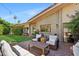 Brick patio featuring outdoor seating and a well-maintained yard at 4525 N 66Th St # 1, Scottsdale, AZ 85251