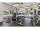 Community gym featuring treadmills, elliptical machine, weight rack and medicine balls at 4525 N 66Th St # 1, Scottsdale, AZ 85251