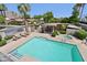 An aerial view of the community pool and hot tub at 4525 N 66Th St # 1, Scottsdale, AZ 85251