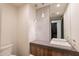Bathroom features modern finishes, and a unique vanity area with modern sink and hanging lights at 5145 N Ascent Dr, Scottsdale, AZ 85251