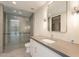 Bathroom features modern finishes, gray tile flooring and a walk in shower with glass door at 5145 N Ascent Dr, Scottsdale, AZ 85251