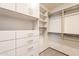 Walk in closet with shelving and drawers and racks for organizing clothing at 5145 N Ascent Dr, Scottsdale, AZ 85251