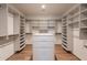 Spacious walk-in closet with custom shelving and drawers for optimal organization at 5145 N Ascent Dr, Scottsdale, AZ 85251
