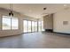 Contemporary living room with a sleek fireplace, modern lighting, and large windows for natural light at 5145 N Ascent Dr, Scottsdale, AZ 85251