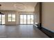 Spacious living room featuring a modern fireplace, contemporary lighting, and large windows at 5145 N Ascent Dr, Scottsdale, AZ 85251