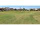 Spacious community park featuring a playground, ample green space, and neighborhood homes at 5439 W Odeum Ln, Phoenix, AZ 85043