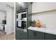 Contemporary kitchen boasting stainless steel appliances, ample counter space, and stylish cabinetry for efficient storage at 5439 W Odeum Ln, Phoenix, AZ 85043