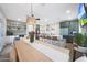 Open-concept kitchen features a large island with bar seating and modern, updated cabinetry at 5439 W Odeum Ln, Phoenix, AZ 85043