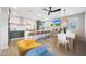 Bright kitchen with a kitchen island, stainless appliances, and open-concept layout at 5439 W Odeum Ln, Phoenix, AZ 85043