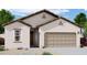 Charming single-story home with a two-car garage and low maintenance desert landscaping at 6022 E Artemis Dr, Florence, AZ 85132