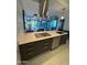 Modern kitchen features stainless steel appliances, a gas cooktop, and views of the outside area at 7120 E Kierland Blvd # 404, Scottsdale, AZ 85254