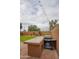 Outdoor kitchen featuring a built-in grill and a spacious countertop at 760 N Swallow Ln, Gilbert, AZ 85234