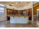 A spacious kitchen featuring custom cabinets, granite countertops, and modern stainless steel appliances at 760 N Swallow Ln, Gilbert, AZ 85234