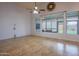 Bright living room featuring tile floors, vaulted ceiling, and big windows at 760 N Swallow Ln, Gilbert, AZ 85234