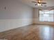 An empty room with lots of space, light, and a ceiling fan at 760 N Swallow Ln, Gilbert, AZ 85234