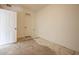 Unfinished room showing concrete floor, ready for renovation at 760 N Swallow Ln, Gilbert, AZ 85234