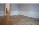 An empty room offering lots of open space and light at 760 N Swallow Ln, Gilbert, AZ 85234