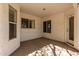 Comfortable outdoor patio with windows and exterior door access at 804 N 46Th St, Mesa, AZ 85205