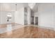 Bright living room featuring hardwood floors, large windows, and a chandelier at 804 N 46Th St, Mesa, AZ 85205