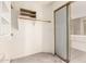 Spacious walk-in closet with shelves, hanging racks, and sliding door at 804 N 46Th St, Mesa, AZ 85205