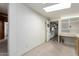 This basement features wood paneling, a storage, a workspace, and a doorway to the outside at 8103 E Southern Ave # 69, Mesa, AZ 85209