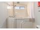 Bathroom featuring walk-in tub, shower and grab bars for accessibility and convenience at 8103 E Southern Ave # 69, Mesa, AZ 85209