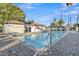 Community pool with a brick patio and bath houses, offering a place to relax and enjoy the weather at 1051 S Dobson Rd # 67, Mesa, AZ 85202