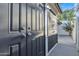 Exterior storage cabinets with access door along side the back patio of the home at 1051 S Dobson Rd # 67, Mesa, AZ 85202