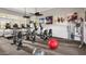 Community gym with treadmills, stationary bikes, and exercise equipment at 10538 E Naranja Ave, Mesa, AZ 85209