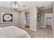 Relaxing main bedroom featuring a luxurious ensuite bathroom and ample closet space, perfect for unwinding after a long day at 10556 W Bloch Rd, Tolleson, AZ 85353