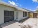 Enclosed backyard with block wall and security screen at 10613 S 41St Pl, Phoenix, AZ 85044
