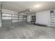 Spacious garage with shelving and room for storage at 10613 S 41St Pl, Phoenix, AZ 85044