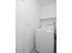 The laundry room features a washer and convenient shelving at 10613 S 41St Pl, Phoenix, AZ 85044