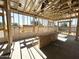 Wood framework of a covered patio showing the transition from indoor to outdoor living space at 11410 E Utah Ave, Mesa, AZ 85212