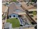 Spacious backyard featuring a covered patio, low maintenance landscaping, a storage shed, and a block fence at 11601 W Bloomfield Rd, El Mirage, AZ 85335