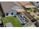 Aerial view of the backyard that showcases the well manicured artificial turf, pergola and privacy fence at 11601 W Bloomfield Rd, El Mirage, AZ 85335